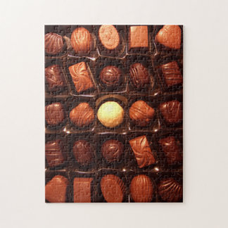 Puzzel die doos van chocoladesnoep kenmerken