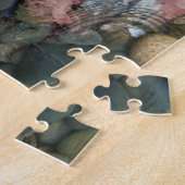 puzzel met waterreflecties en rotsen (Zijkant)