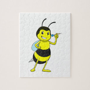 Puzzle Abeille aux fléchettes avec tarte