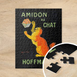 Puzzle Amidon Au Conversation | Leonetto Cappiello<br><div class="desc">Amidon Au Conversation (1903) | L’affiche publicitaire vintage de Leonetto Cappiello, Amidon Au Conversation pour Hoffman, présente un chat orange fantaisiste qui interagit avec une boîte d’amidon, dressée contre un arrière - plan noir frappant. L'orange vif du chat et la typographie audacieuse créent un design à contraste élevé qui attire...</div>