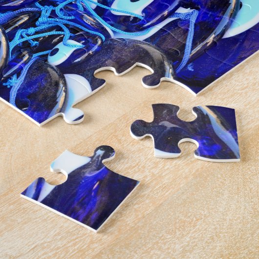 Puzzle Amulettes d'yeux bleues (Côté)