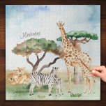Puzzle Aquarelle maman et bébé Animaux africains<br><div class="desc">Ajoutez un adorable thème de safari personnalisé à votre collection de jeux avec ce joli puzzle animal d'aquarelle africaine. Puzzle a mammy et des petites girafes, zèbres et lions dans un arrière - plan de savane africaine. Il y a aussi un endroit pour un prénom (qui peut être supprimé selon...</div>