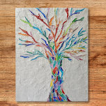 Puzzle Arbre arc-en-ciel de la mosaïque de la vie<br><div class="desc">Ce puzzle décoratif présente une empreinte d'un arbre en mosaïque de couleur arc-en-ciel. Le design original a été réalisé en mosaïque à l'aide de minuscules fragments de verre aux couleurs vives,  placés dans un arrière - plan en plâtre gris pâle. Design original de la mosaïque © Michele Davies</div>