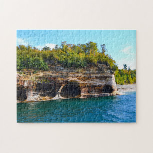 Puzzle avec la boîte-cadeau/roches décrites