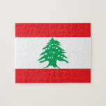 Puzzle avec le drapeau du Liban<br><div class="desc">Mettez-vous au défi avec notre puzzle captivant avec le drapeau du Liban ! Ce puzzle de haute qualité affiche fièrement le design du drapeau libanais, avec une bande rouge horizontale en haut et en bas, avec une bande blanche plus large au milieu. Au coeur de la bande blanche se trouve...</div>