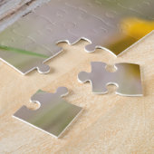 Puzzle Baltimore Oriole female in flower garden (Côté)