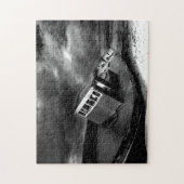 Puzzle Bateau au repos sur une plage. (Vertical)