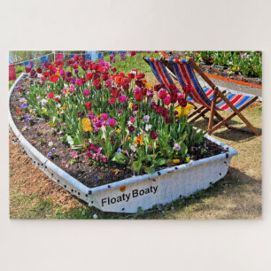 Puzzle Bateau rempli de fleurs au bord du lac