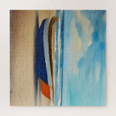 Puzzle Bateau rouge et bleu sur une plage de sable (Horizontal)