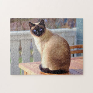 Puzzle Beau chat siamois aux yeux bleus
