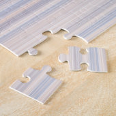 Puzzle Bords fins dans les tons bleus et rouges. (Côté)
