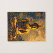 Puzzle Bouddha assis doré sous un ciel de coucher de sole (Horizontal)