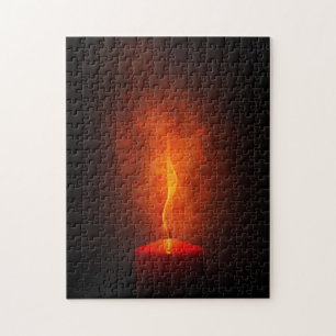 Puzzle Bougie rouge avec lumière chaude