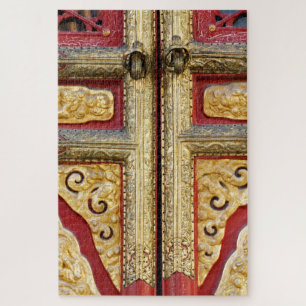 Puzzle Broderie métallique dorée sur la porte