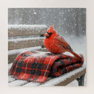 Puzzle Cardinal rouge sur une couverture écossaise enneig