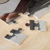 Puzzle Casquette de cowboy sur la rangée de bottes de cow (Côté)