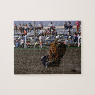 Puzzle Cavalier de rodéo tombant du taureau