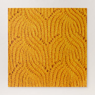 Puzzle Chandail en tricot orange, arrière - plan texturé.