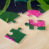 Puzzle Chat noir dans un jardin fleuri coloré (Côté)