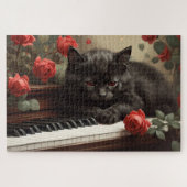 Puzzle Chat noir mignon allongé sur un piano (Horizontal)