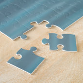 Puzzle Chat rose avec poisson rouge sur une table bleue (Côté)