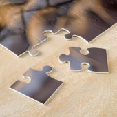 Puzzle Chat se prélassant sur un canapé avec couverture e (Côté)