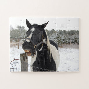 Puzzle Cheval mignon mâcher sur une clôture