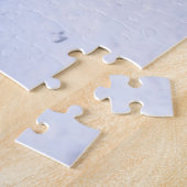 Puzzle Chien de Poméranie en neige assis sur un camion de (Côté)