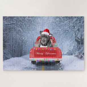Puzzle Chien Pit Bull dans la neige assis dans un camion