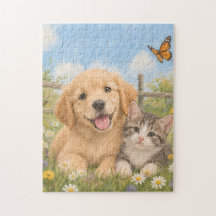 Chiot Golden Retriever et chaton tabby 