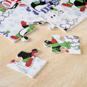 Puzzle Christmas penguin ice skating (Côté)