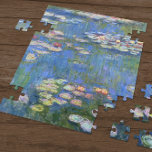 Puzzle Claude Monet // Nappes d'eau<br><div class="desc">Water Lilies est une série d'environ 250 peintures à l'huile réalisées par l'impressionniste Claude Monet (1840-1926). Les peintures représentent le jardin fleuri de Monet à Giverny et ont été l'objet principal de la production artistique de Monet pendant les dernières trente années de sa vie.</div>