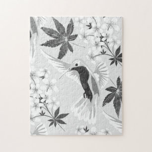 Puzzle Colibris et fleurs blanches.