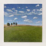 Puzzle Collines vertes avec ciel bleu au-dessus de la nat<br><div class="desc">Ce puzzle amusant présente une belle photo d'une journée ensoleillée d'été avec de l'herbe verte au premier plan et un ciel bleu au-dessus. Il y a quelques arbres et des collines à l'horizon. Super jeu pendant des jours quand vous êtes coincé à l'intérieur.</div>