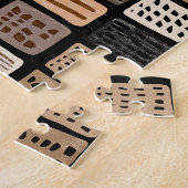 Puzzle conceptions de textiles en boue africaine dans une (Côté)