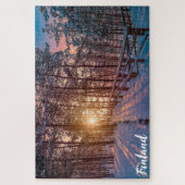 Puzzle Coucher de soleil dans la pinède enneigée avec ray (Vertical)