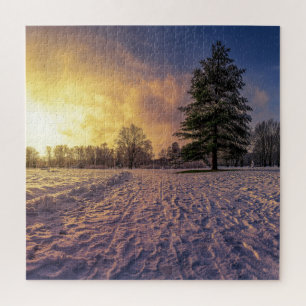 Puzzle Coucher de soleil sur le parc d'hiver enneigé