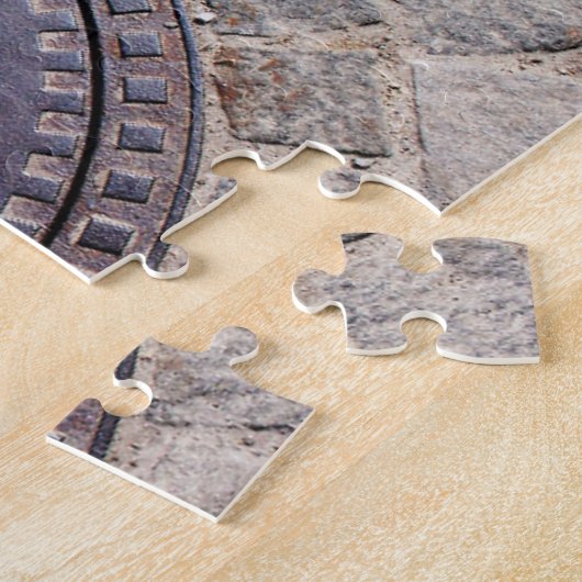 Puzzle Couvre-trou et route pavée (Côté)