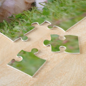 Puzzle Cute chaton jouant dans un jardin fleuri .. (Côté)