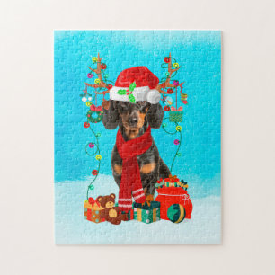 Puzzle Dachshund dans la neige avec cadeaux de Noël