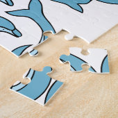 Puzzle Dauphins bleus entourant Thunder_Cove (Côté)