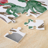 Puzzle de dinosaure mignon et de volcan en éruptio (Côté)