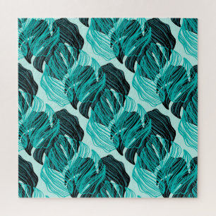 Puzzle Design feuille de palmiers tropicaux vert.