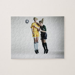 Puzzle Deux footballeurs féminins dans se diriger de