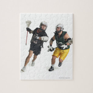 Puzzle deux joueurs de crosse masculin caucasiens de