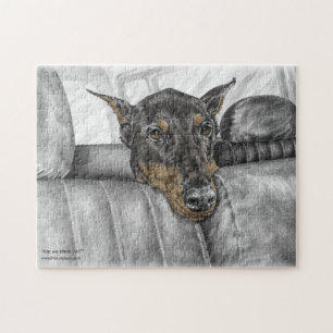 Puzzle Doberman en voiture