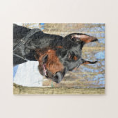 Puzzle Doberman pinscher dans la neige (Horizontal)
