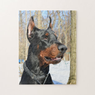 Puzzle Doberman pinscher dans la neige