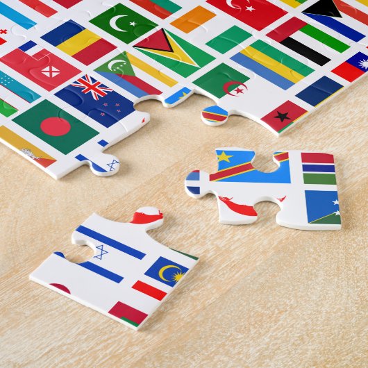 Puzzle drapeaux du monde contre blanc (Côté)