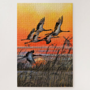Puzzle du coucher de soleil avec oiseaux volants -